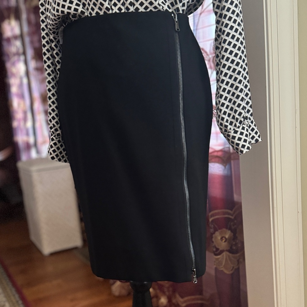 Black shirt with zipper hits knee size 2 Ann Taylor
